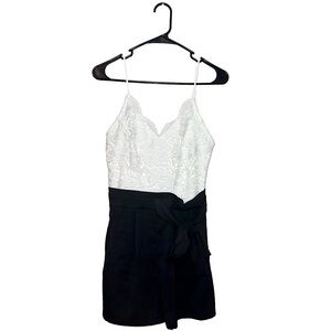 Junior’s White Lace Romper with Black Bottoms and Black Belt